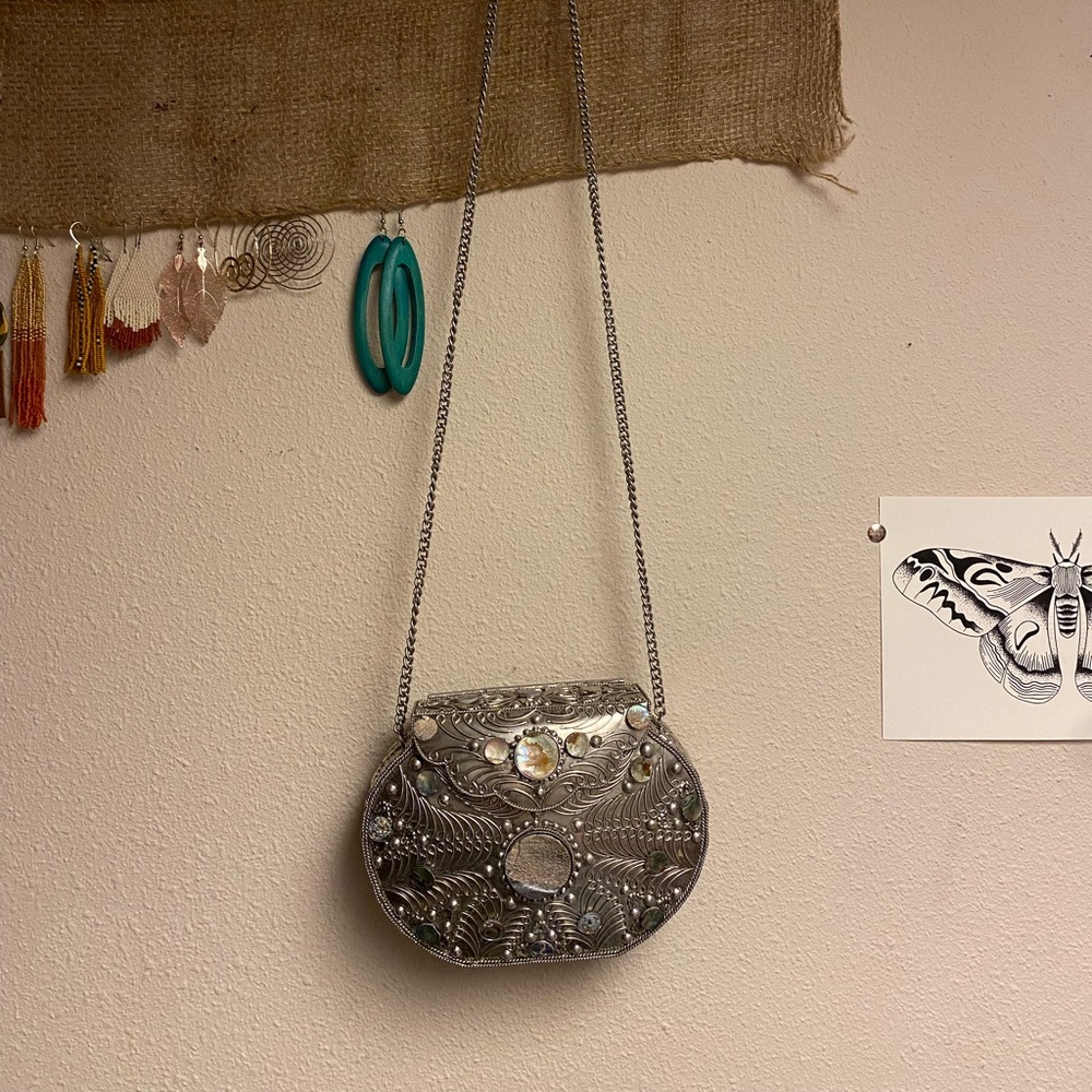 Metal purse with abalone inlay